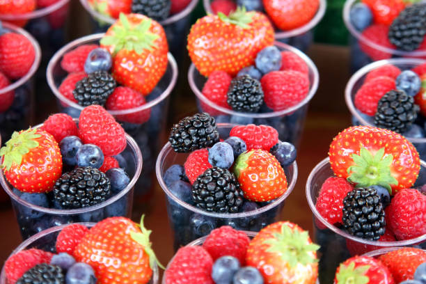 istock set of different berries in glasses 1060185958