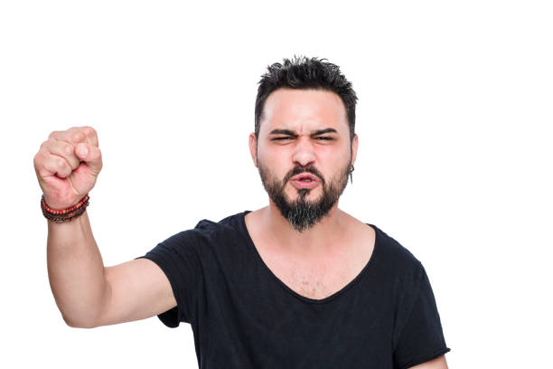 istock Excited Young Man Shaking Fists 1060190756