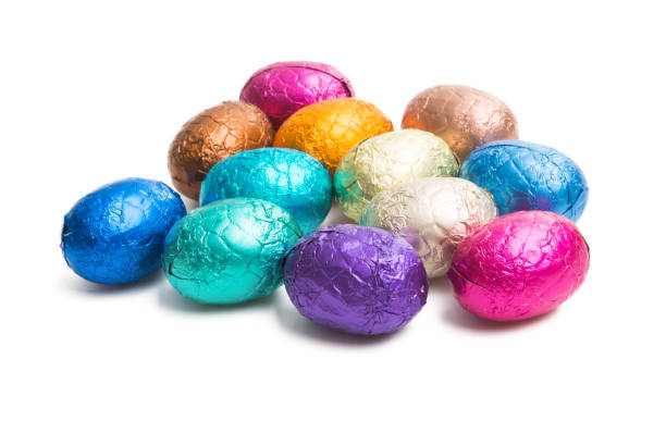 istock chocolate eggs in color foil isolated 1060193334