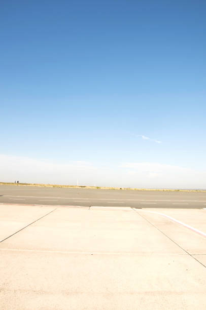 istock An Empty Airport Tarmac. Clear Sky Background 1060199854