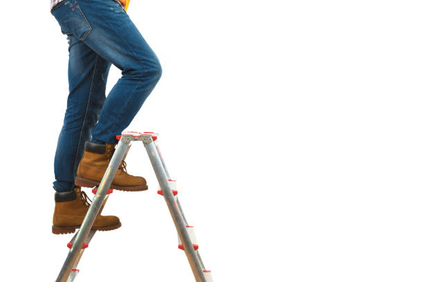 istock The legs on the ladder on the white background 1060201464