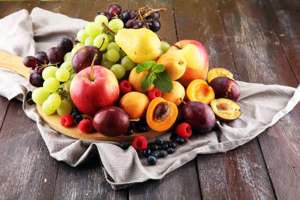 istock Fresh summer fruits with apple, grapes, berries, pear and apricot 1060201498