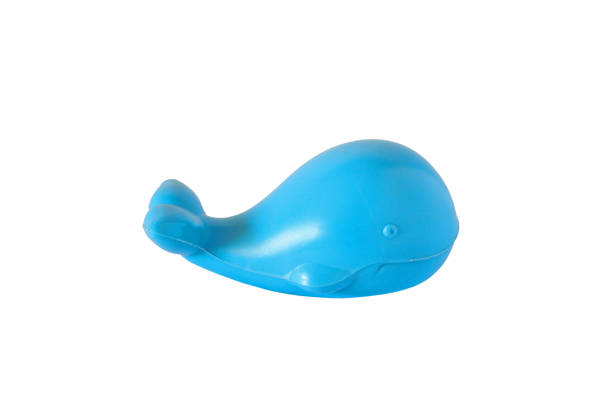 istock Image of plastic baby toy blue whale isolated on white background. 1060201648