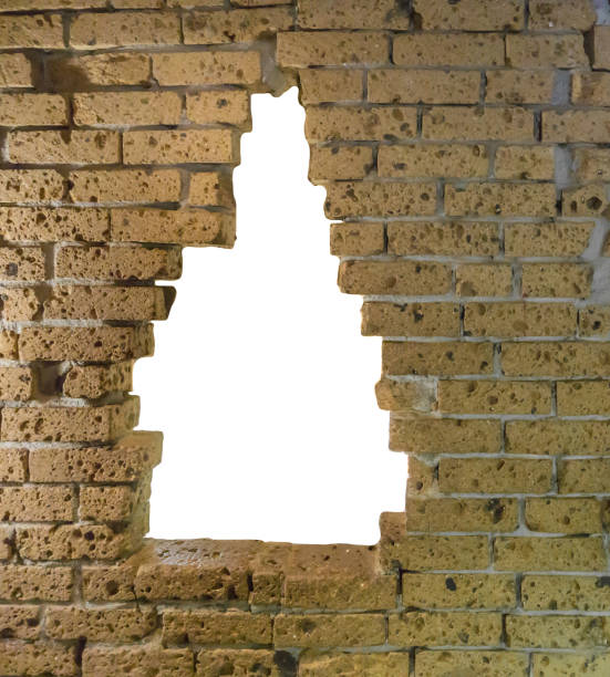istock old historic looking yellow brick wall with a large opening cut out and isolated on white beautiful ruin texture background 1060202336