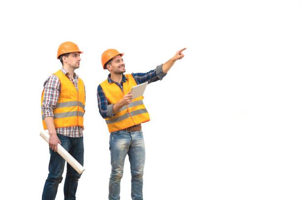 The two engineers with a tablet gesture on the white background