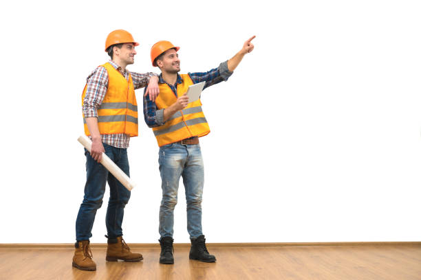 istock The two engineers with a tablet gesture on the white wall background 1060202602
