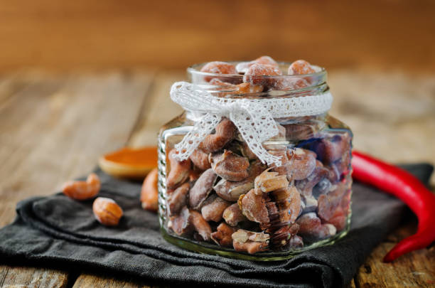 istock Honey red pepper roasted cashews in a glass 1060205790