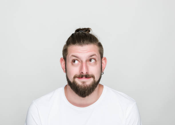 istock Portrait of thoughtful young men over white background 1060212646