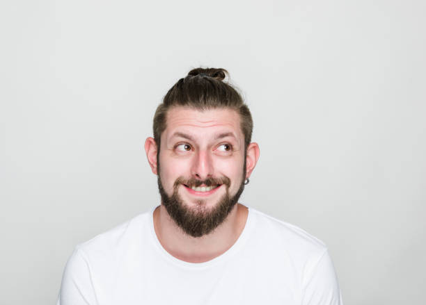 istock Portrait of thoughtful young men over white background 1060212676