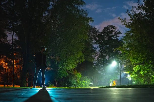istock The man standing in the night park 1060213724
