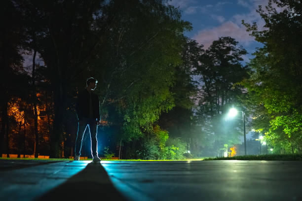 istock The man standing in the night park 1060213726