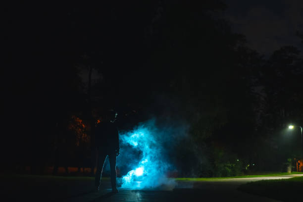 istock The man standing in the smoke. evening night time 1060213728