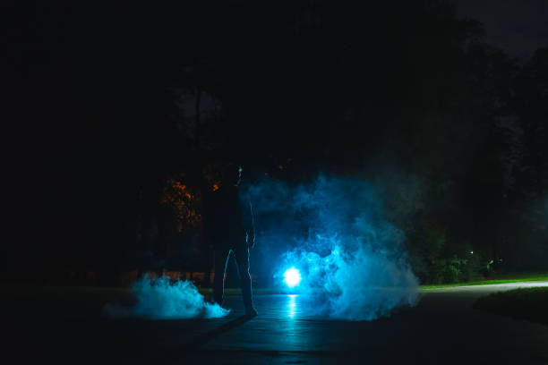 istock The man standing in the smoke. evening night time 1060213734