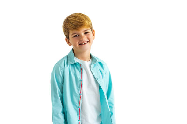 istock The little boy standing on the white background 1060214966