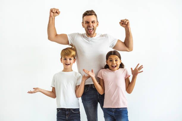 istock The father and kids gesturing on the white background 1060218092
