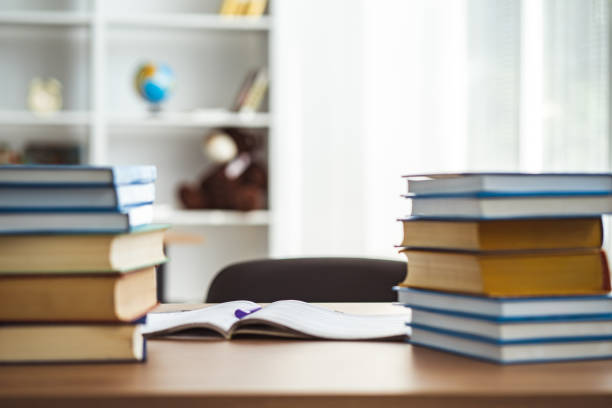 istock The books and a notebook on the desk 1060219380