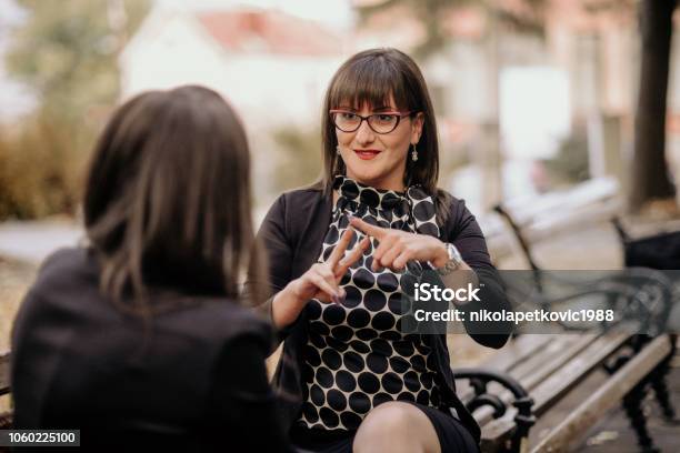 Sign Language Stock Photo - Download Image Now - Sign Language, Deafness, Women