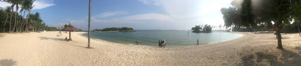 panorama de la playa de tanjong en sentosa island - tampines fotografías e imágenes de stock
