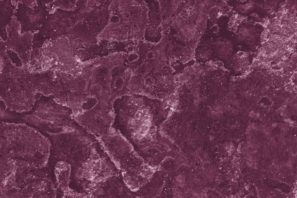 istock Venetian plaster wall, burgundy color. Close up. 1060241904