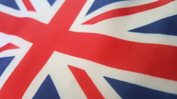 istock United Kingdom flag close up 1060242388