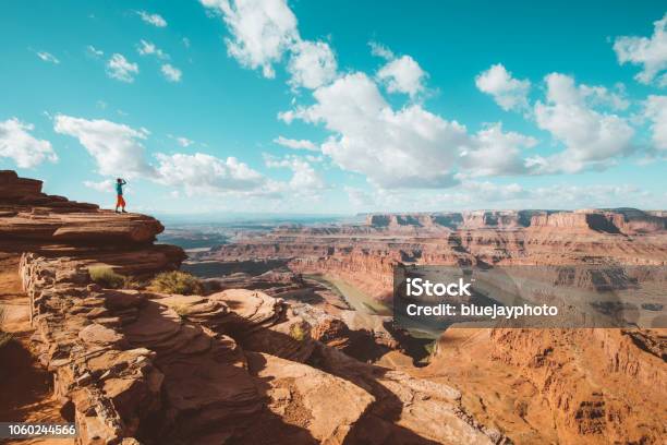 Hiker On A Cliff In Dead Horse Point State Park Utah Usa Stock Photo - Download Image Now