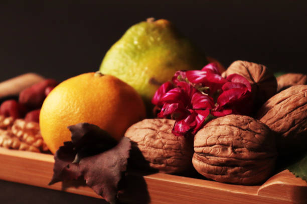 black background, healthy fruits and snacksblack background, healthy fruits and snacks