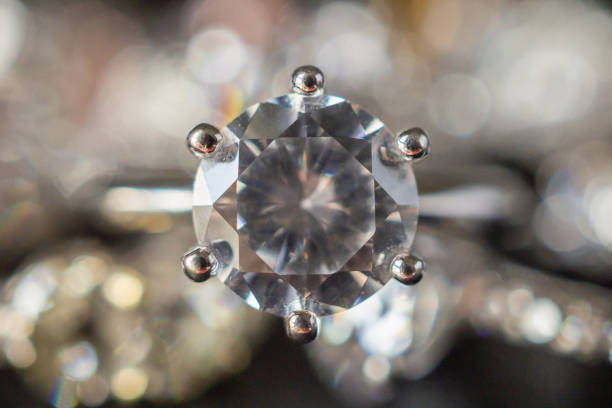 istock Jewelry diamond rings set on black background close up 1060280446