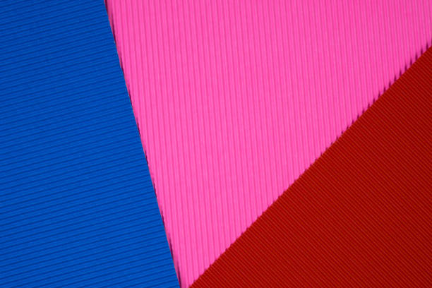 istock Multi coloured corrugated paper texture, use for background. vivid colour with empty space for add text or object. 1060280560