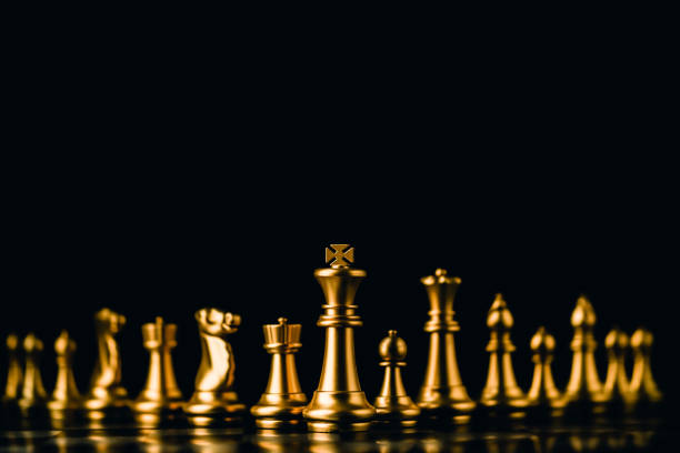 istock business strategy brainstorm chess board game with hand touch black background with free copy space for your text 1060280670