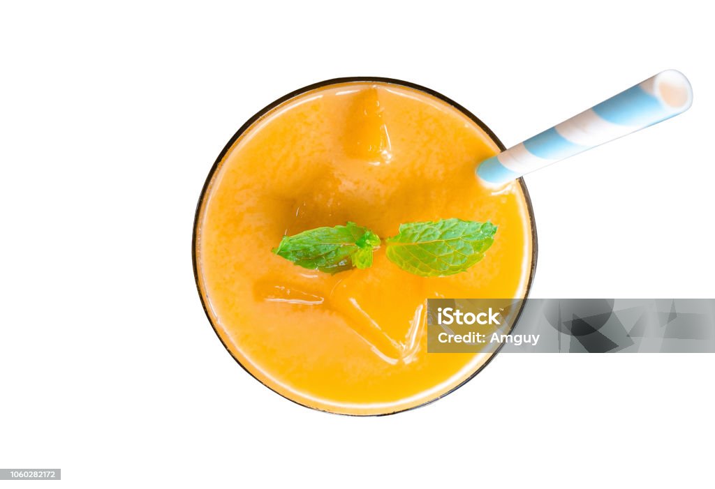 Mango smoothies yellow colorful fruit juice milkshake blend beverage healthy high protein the taste yummy In glass drink to lose weight drink episode morning isolated on white background from top view. Top - Garment Stock Photo