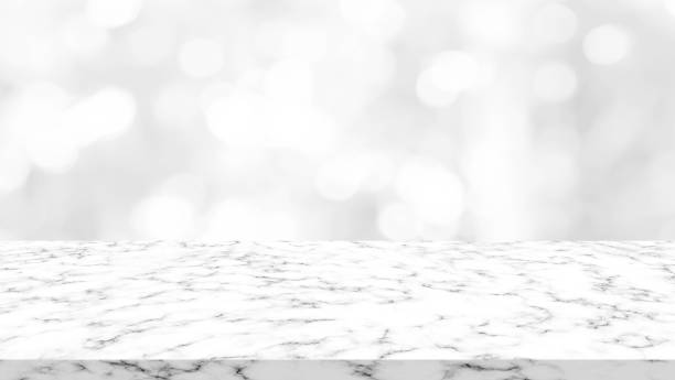 istock abstract blurred glowing gray color gradient background with marble countertop perspective for advertise , promote on image 1060283484