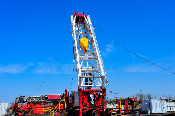 istock Oil field oil workers at work 1060289604