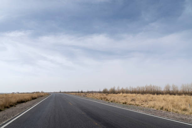 istock The highway is against a blue sky background 1060324742