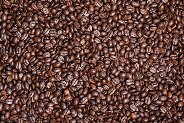 istock Horizontal background of roasted Colombian coffee beans 1060326704