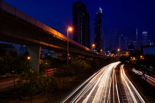 istock night cityscape and light tail on twilight time - can use to display or montage on product 1060327058