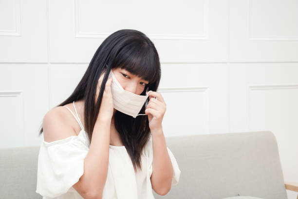 istock Woman with  face mask protection. 1060340460