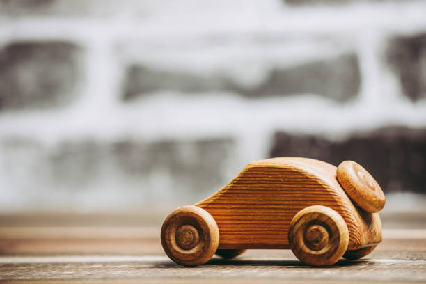 istock Wooden cars and brick background 1060343246
