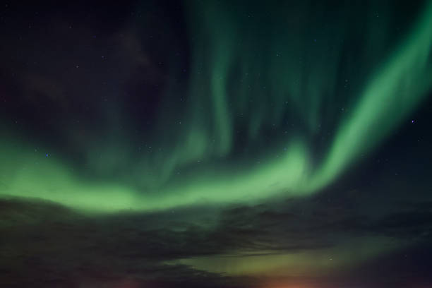 istock Aurora borealis, Northern lights dancing in the sky 1060344942
