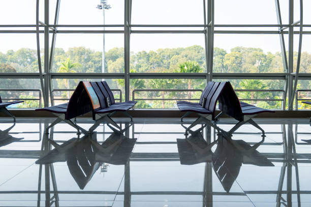 istock Rows chair with glass window at terminal gate 1060344978