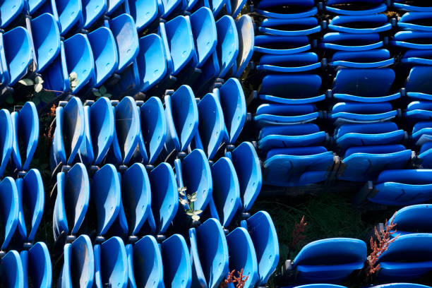istock Blue pavilion stadium fold up plastic seats aerial view from above stored for exhibition event 1060347720