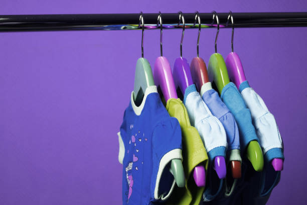 istock Clothes for kids on hangers 1060356466