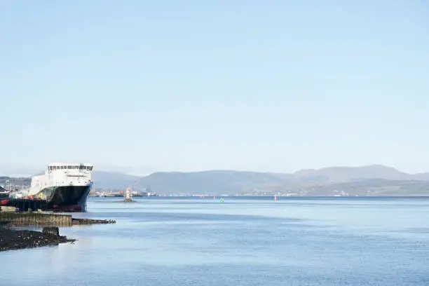 Port Glasgow Ship in port harbour clear blue sky shipbuilding for new ferry construction uk