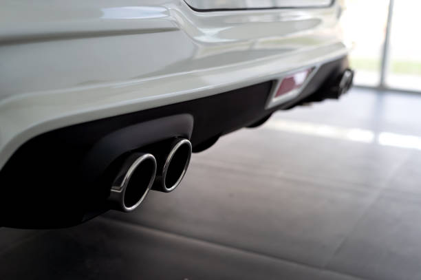 istock closeup car exhaust pipe with soft-focus and over light in the background 1060380590