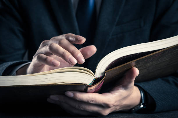 istock Books and suits men 1060380646