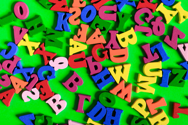 istock Green background and alphabet 1060380820