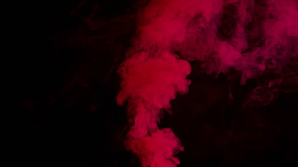 istock Colorful Smoke on Dark Background 1060383602
