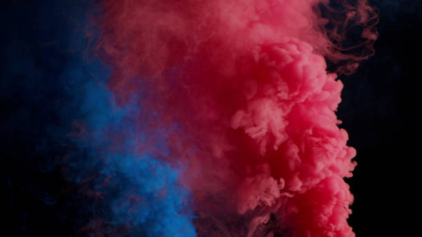 istock Colorful Smoke on Dark Background 1060383626