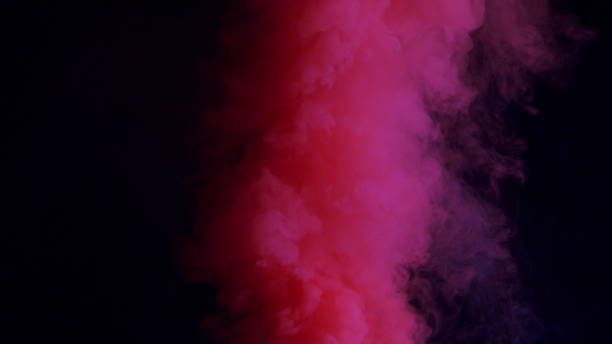 istock Colorful Smoke on Dark Background 1060383636