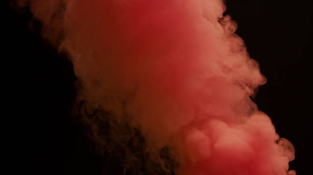 istock Colorful Smoke on Dark Background 1060383670