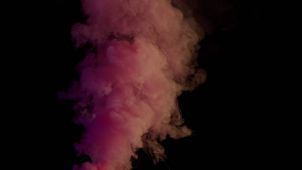 istock Colorful Smoke on Dark Background 1060383678